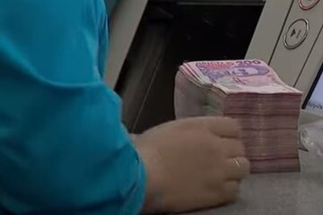 Деньги. Фото: скриншот YouTube-видео
