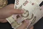 Деньги. Фото: скриншот YouTube-видео