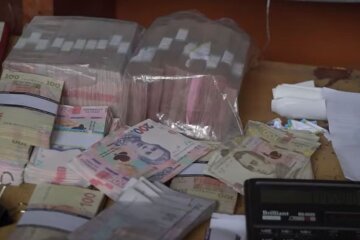 Деньги. Фото: скриншот YouTube-видео