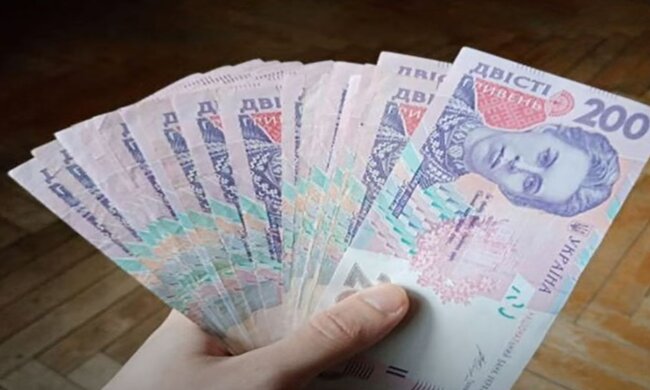 Деньги. Фото: скриншот YouTube-видео