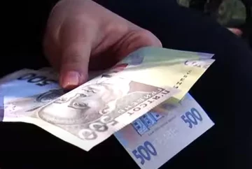 Деньги. Фото: скриншот YouTube-видео