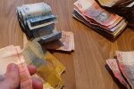 Гроші. Фото: скріншот YouTube-відео