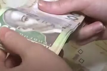 Деньги. Фото: скриншот YouTube-видео