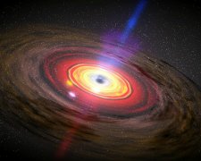 В космосе вот-вот столкнутся две супермассивные черные дыры. Эксперты гадают, чем это грозит Земле. Фото