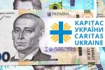 Грошова допомога від Карітас. Фото: Telegram