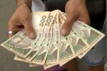 Купюры в 500 грн. Фото: скриншот YouTube-видео
