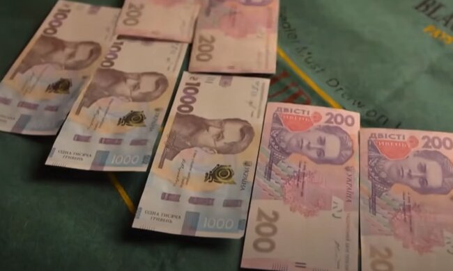 Деньги. Фото: скриншот YouTube-видео