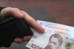 Деньги. Фото: скриншот YouTube-видео