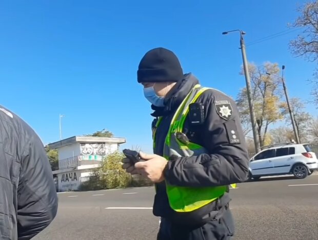 Полицейский. Фото: скриншот YouTube-видео