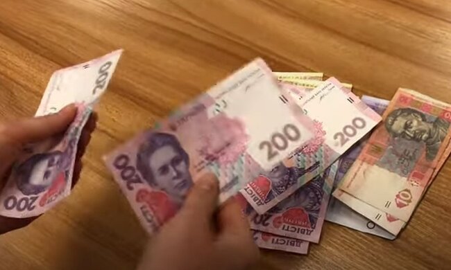 Деньги. Фото: скриншот YouTube-видео