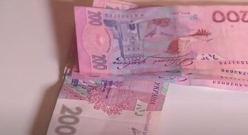 Деньги. Фото: скриншот YouTube-видео