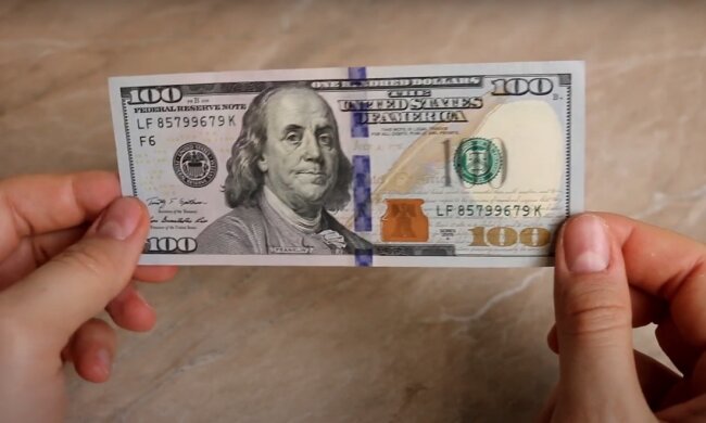 Доллары. Фото: YouTube, скрин