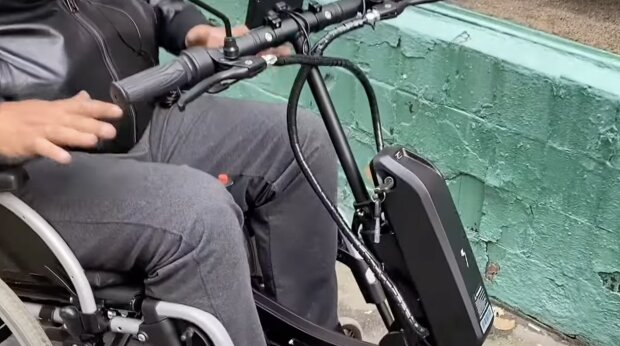 Инвалидная коляска, скриншот из YouTube