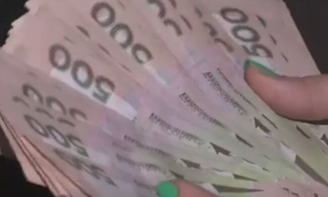 Деньги. Фото: скриншот YouTube-видео