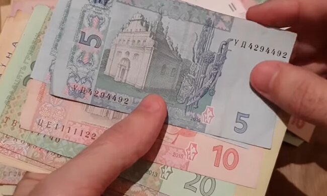 Деньги.  Фото: скриншот YouTube-видео