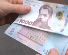 Купюры 1000 грн. Фото: скриншот YouTube-видео