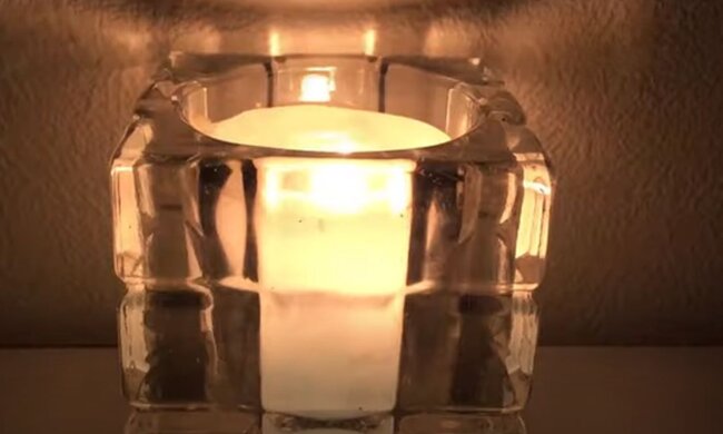 Свічка. Фото: скріншот YouTube-відео