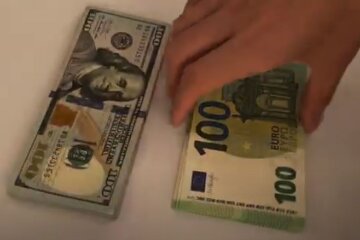 Доллары и евро. Фото: скриншот YouTube-видео