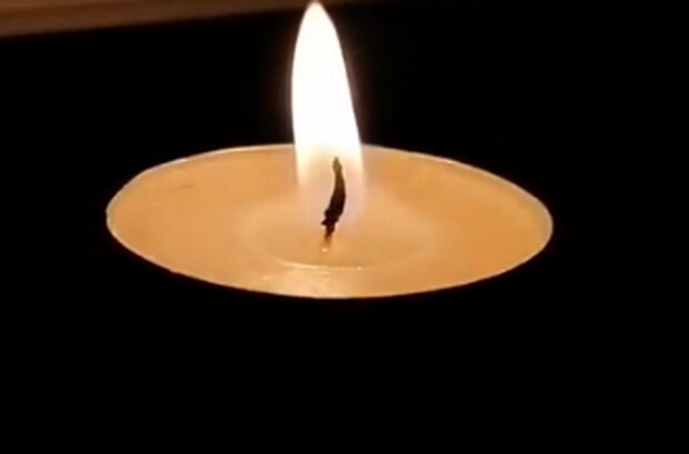 Свічка скорботи. Фото: скріншот YouTube-відео