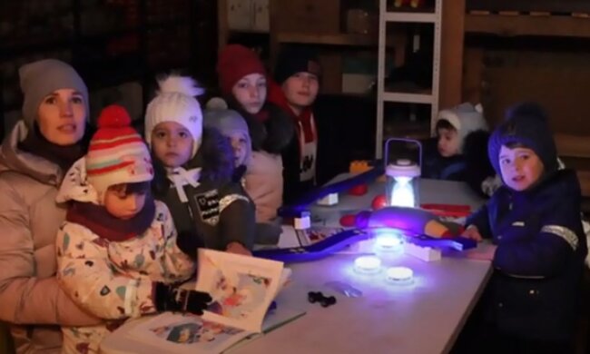 Діти в укритті. Фото: скріншот YouTube-відео