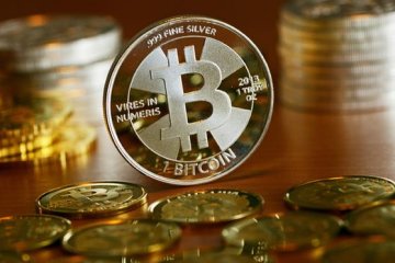 Биткоин. Фото: DW