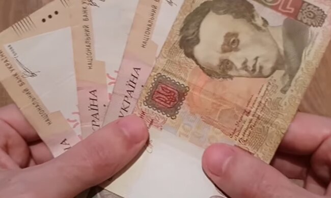 Деньги.  Фото: скриншот YouTube-видео
