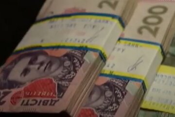 Деньги. Фото: скриншот YouTube-видео