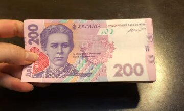 Деньги. Фото: скриншот YouTube-видео