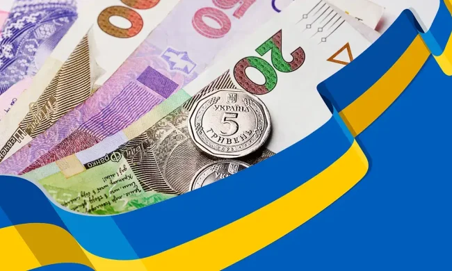 Українські гривні в руках, грошова допомога
