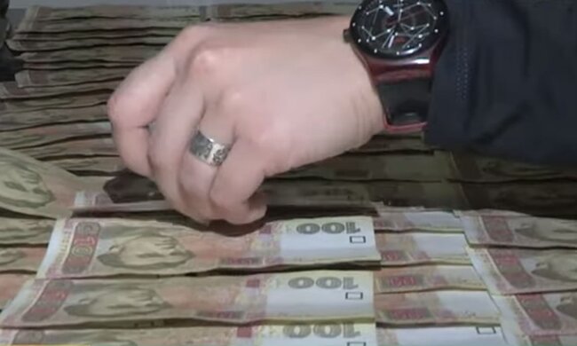 Гроші. Фото: скріншот YouTube-відео