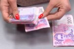 Деньги. Фото: скриншот YouTube-видео