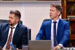Чиновники. Фото: скриншот YouTube-видео.