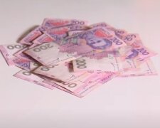 Деньги. Фото: скриншот YouTube-видео