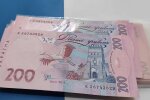 Деньги.  Фото: скриншот YouTube-видео