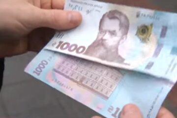 Купюри 1000 грн. Фото: скріншот YouTube-відео