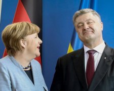 Порошенко в телефонном разговоре попросил Меркель «нажать» на Россию
