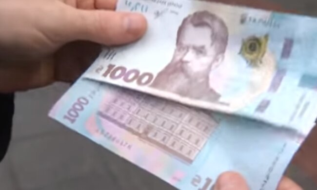 Купюри 1000 грн. Фото: скріншот YouTube-відео