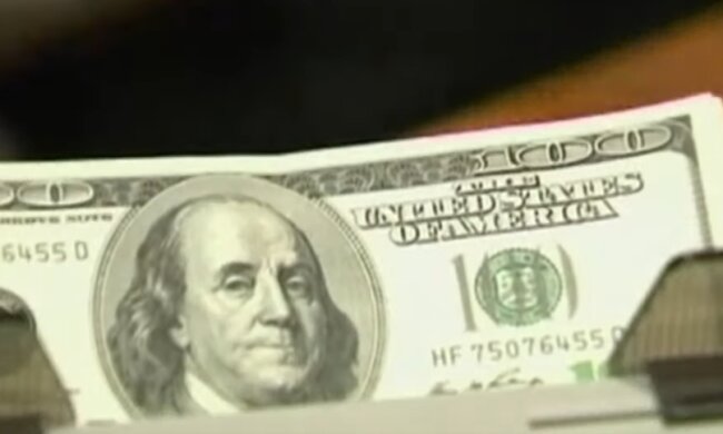Доллары. Фото: скриншот YouTube-видео