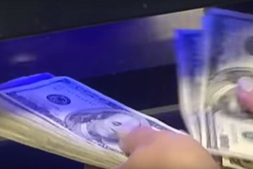 Курс доллара снизился. Фото: скрин ТСН