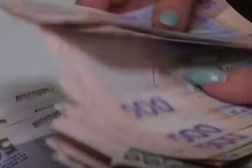 Деньги. Фото: скриншот YouTube-видео