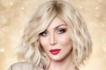 Ирина Билык показала архивное фото: папа в тельняшке и она с короткой стрижкой