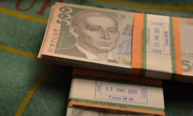 Деньги. Фото: скриншот YouTube-видео