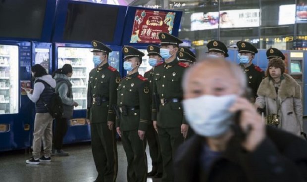 Китайские города, ставшие очагами эпидемии, блокирует армия. Фото: newsvoice