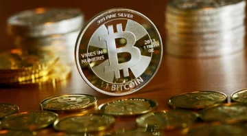 Биткоин. Фото: DW