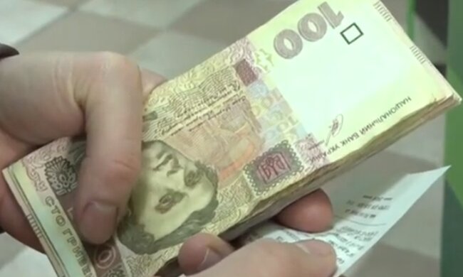 Деньги. Фото: скриншот YouTube-видео