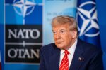 Флаги стран НАТО на саммите — США планируют сократить военное присутствие в Европе