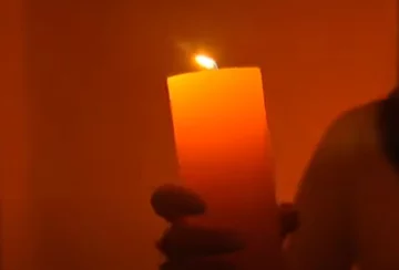 Свеча. Фото: скриншот YouTube-видео