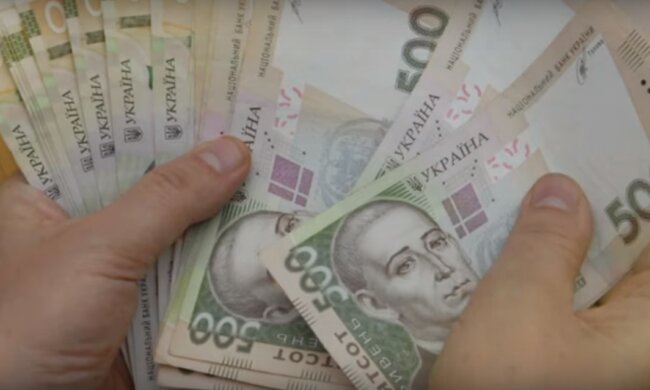 Деньги. Фото: скриншот Youtube-видео.