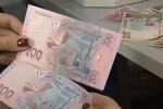 Деньги. Фото: скриншот YouTube-видео