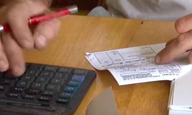 Комунальні платежі. Фото: скріншот YouTube-відео